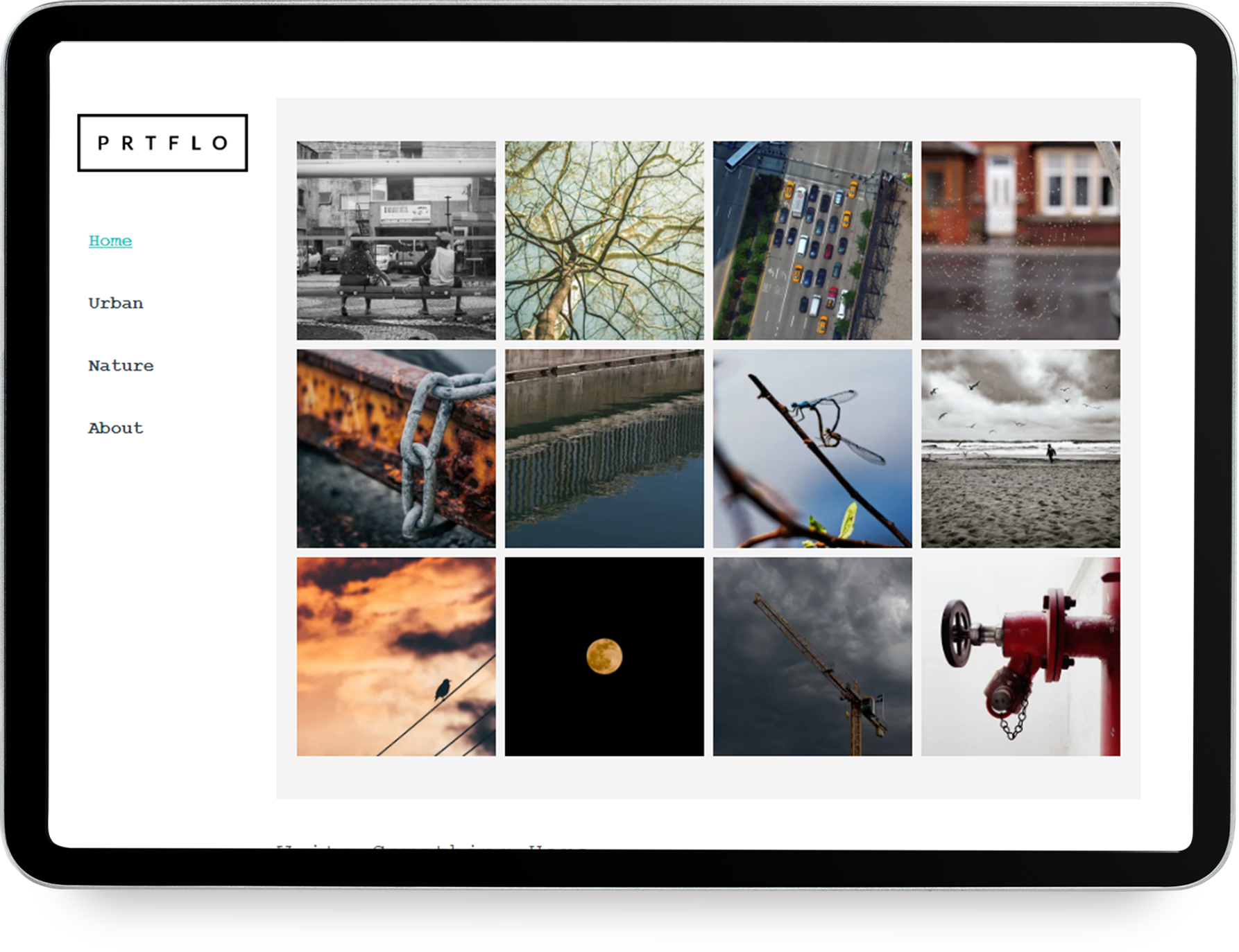 A woman is standing in front of a building on a tablet.