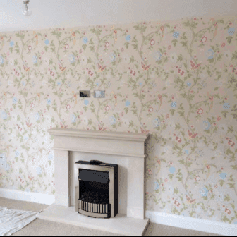 feature wallpapering with fireplace