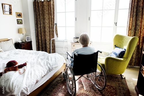 elderly women in wheelchair in old folks home