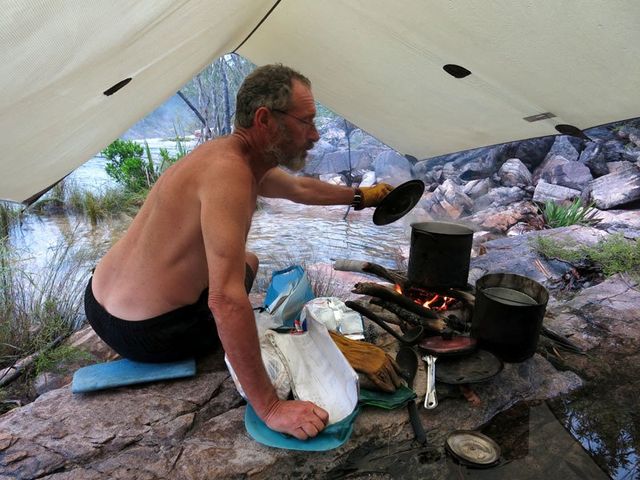 Kakadu wet season expedition, preparing dinner under the group fly