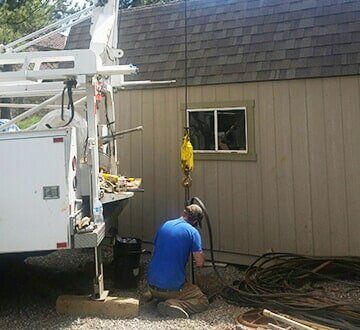 An artesian well pump that provides water to private house requires maintenance. An artesian well pump that provides water to private house requires maintenance.