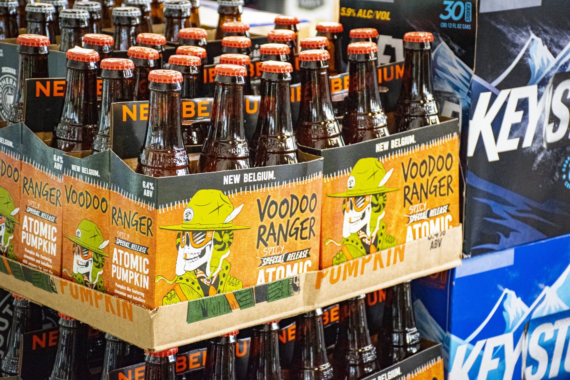 Cases of Voodoo Ranger Pumpkin beer and Keystone Light beer.