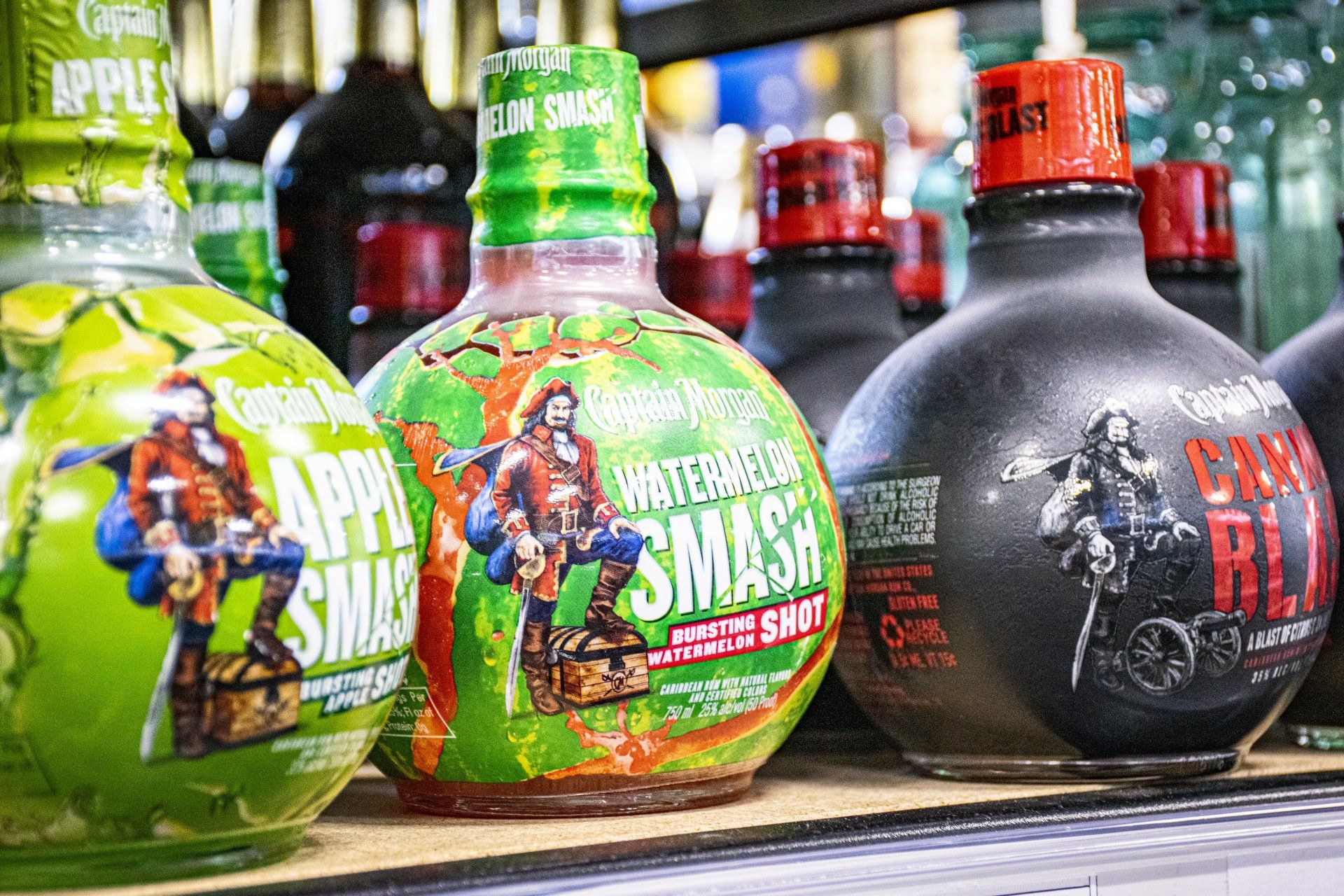 Bottles of alcoholic beverages: Apple Smash, Watermelon Smash, and Fox Rider.