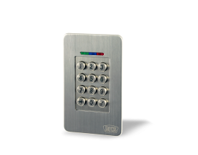 Una tastiera in acciaio inossidabile è appoggiata su una superficie bianca.