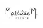 Le logo de matilde m. france est écrit en cursive sur fond blanc.