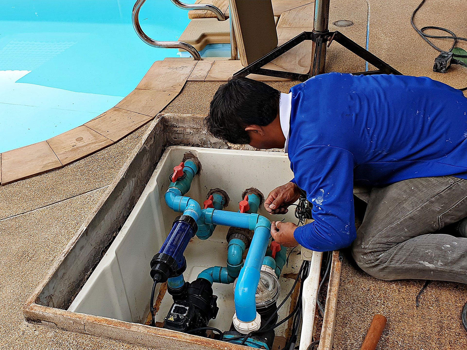 Pool leak detection being performed by technician in Omaha, NE