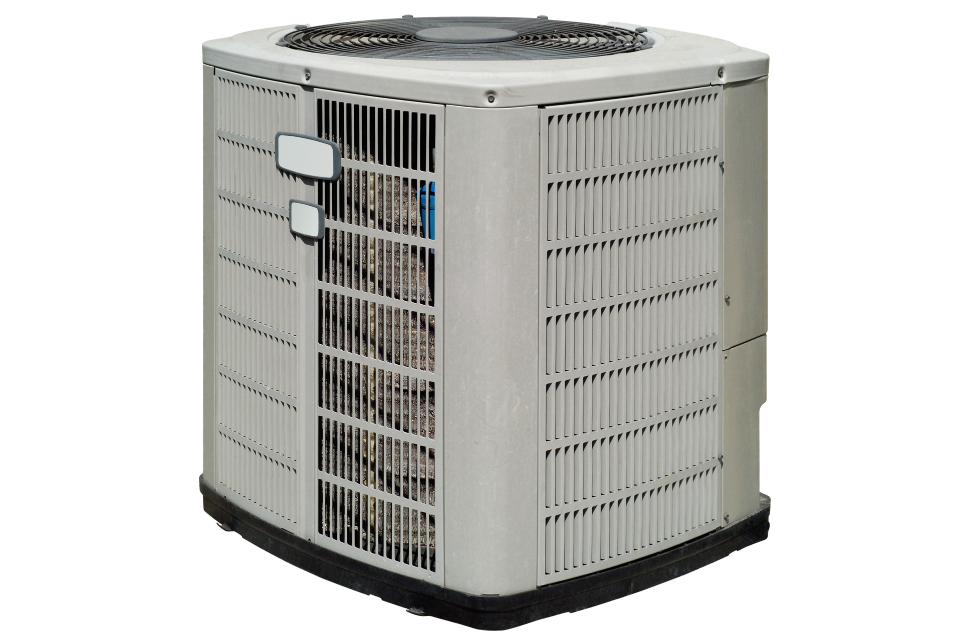 A white air conditioner is sitting on a white surface.