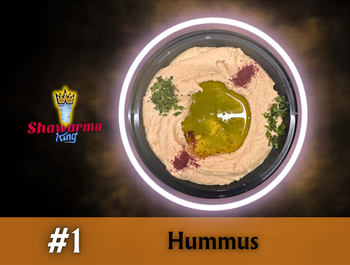 Hummus in a bowl, garnished with oil, parsley, and paprika, presented by Shawarma King.