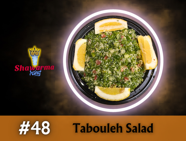 Tabouleh salad with lemon wedges in a black bowl, logo 