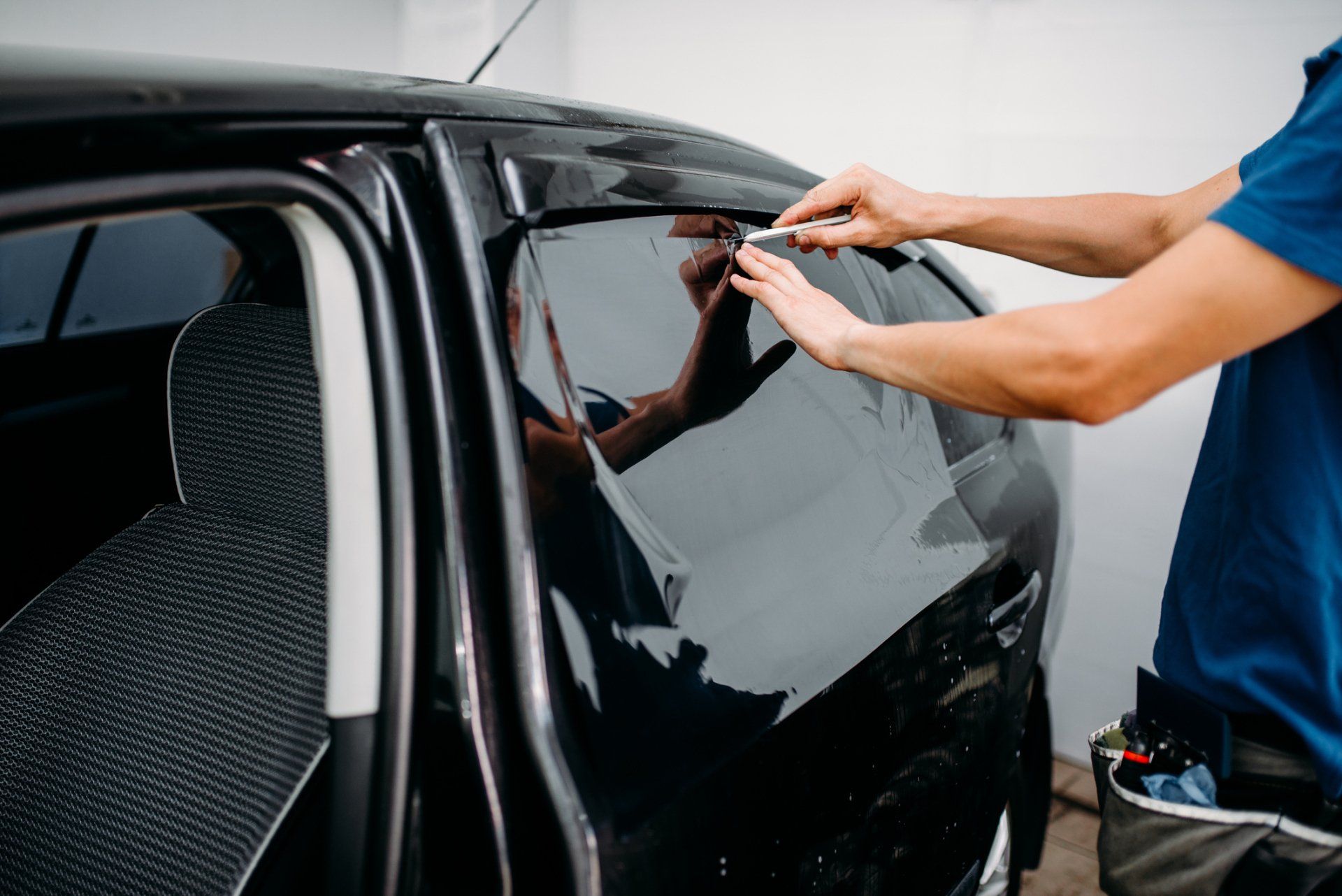 Fixing Green Car — Orange County, CA — Expert Auto Glass Tiny & Upholstery