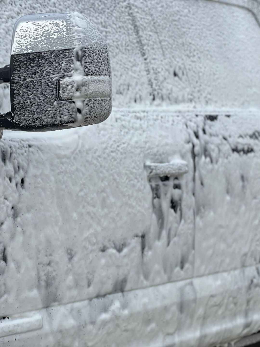 A close up of a car wheel with a mercedes logo on it