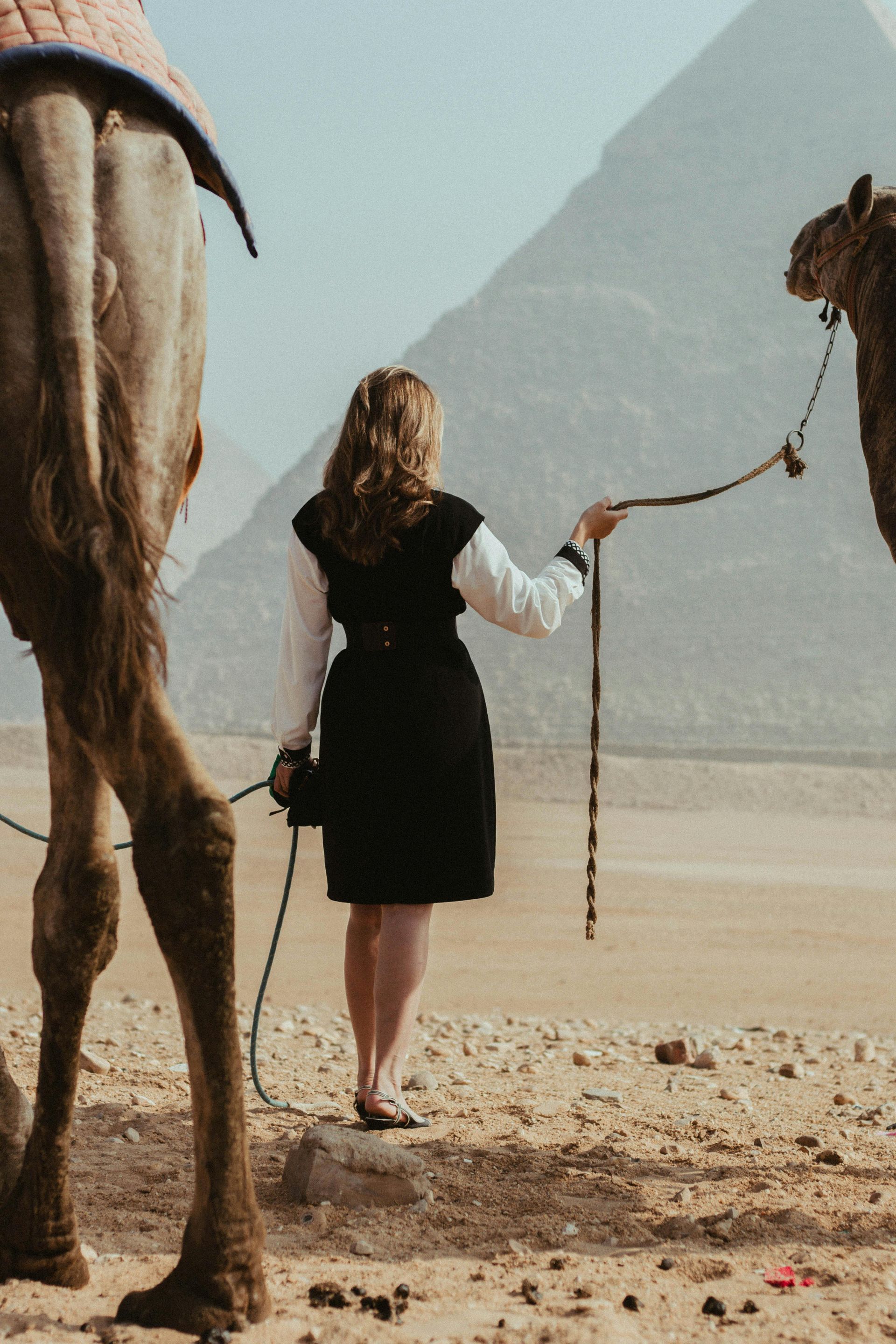 Tourist exploring the desert near the Giza Pyramids