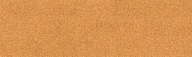 Eine Nahaufnahme eines Stücks Holz mit körniger Textur.