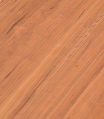 Eine Nahaufnahme eines Holzbodens mit einem diagonalen Muster.