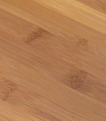 Eine Nahaufnahme einer Holzoberfläche mit Maserung und Struktur.