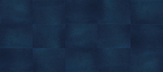 Eine Nahaufnahme eines dunkelblauen Hintergrunds mit Quadraten.