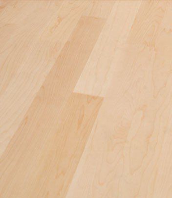 Es ist eine Nahaufnahme eines Holzbodens.