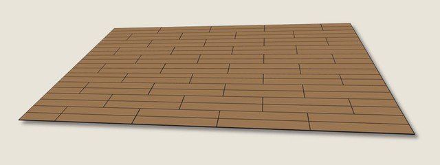 Auf einem Ziegelboden liegt ein Stück Pappe.