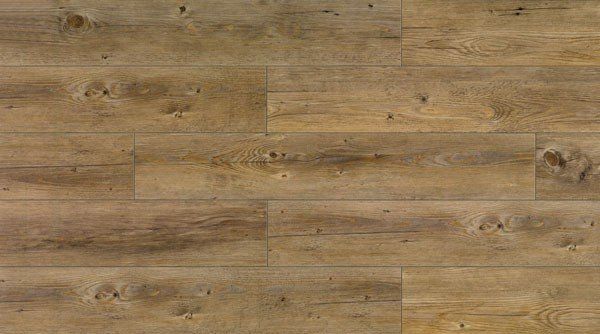 Eine Nahaufnahme eines Holzbodens mit Maserung.