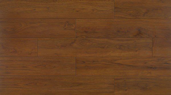 Eine Nahaufnahme eines Holzbodens mit Maserung und Struktur.