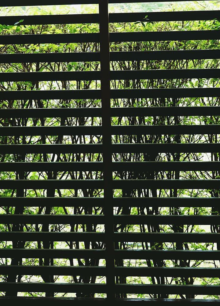 Dark, Horizontal Slats of a Window — A & B Lattice World & Patios in Bungalow, QLD