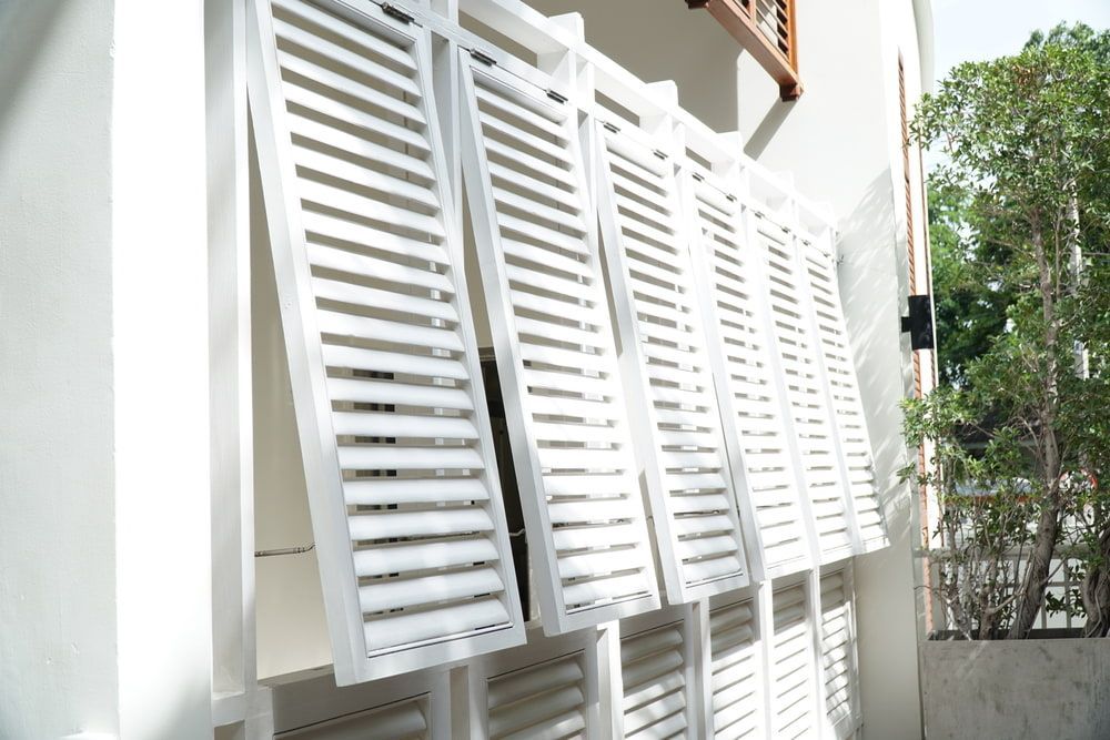 White Louver, Partially Open, on a Building Exterior — A & B Lattice World & Patios in Bungalow, QLD