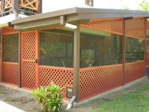 A Screened in Porch with A Lattice Fence and A Door  — A & B Lattice World & Patios in Bungalow, QLD