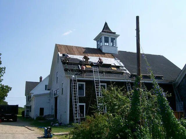 Workers Installing Shingles Roof — Laconia, NH — Rooftop Construction LLC