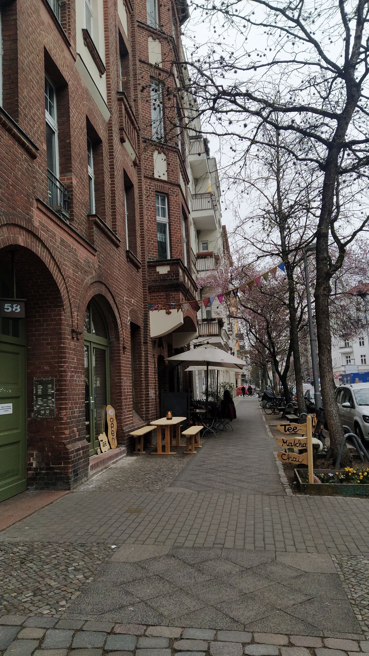 Teeraum Sanvian tables and benches in front of it in Berlin