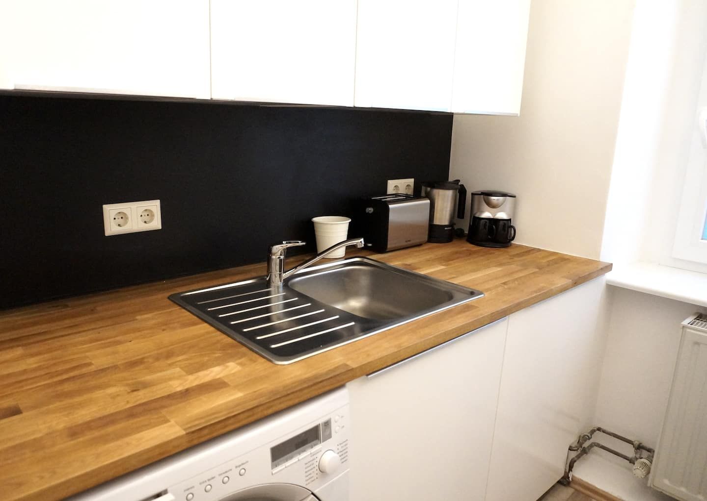 Kitchen sink and toaster