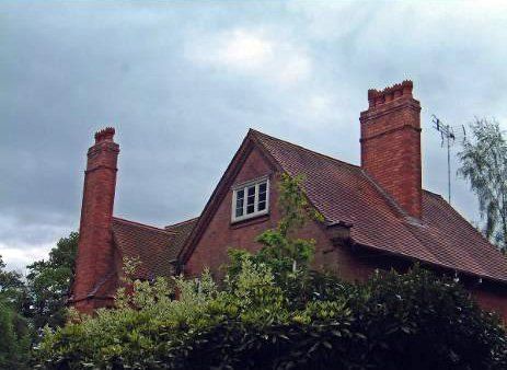 Loft conversion in large detached house with two chimneys