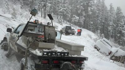 Emergency Tow Truck — Light Tow Truck On Snow in Gallatin County, MT