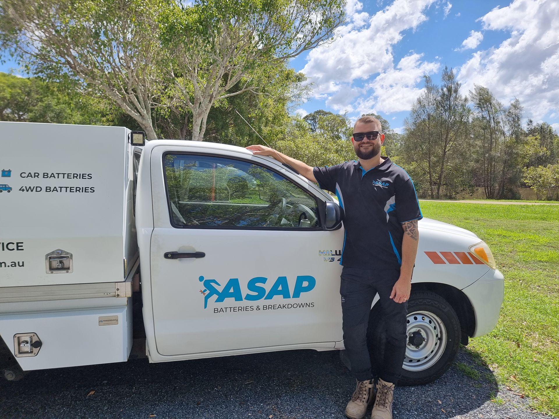 Man in Work Uniform Stands — ASAP Batteries & Breakdowns in Burleigh Heads, QLD