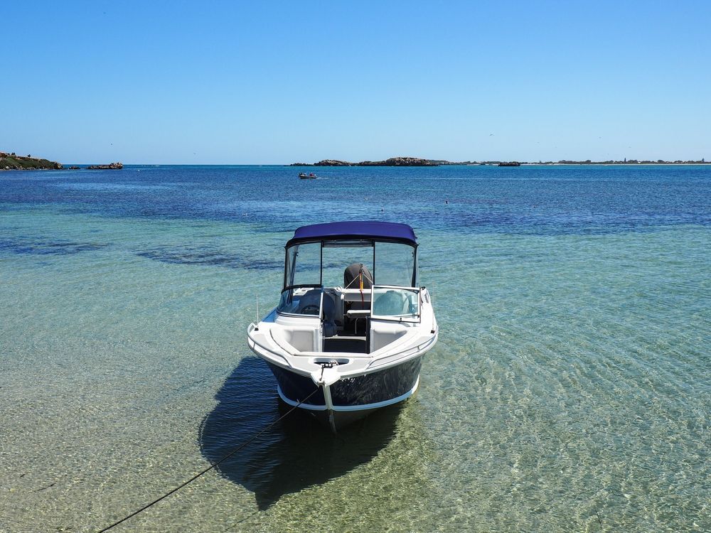 Boat Beached in Shallow, Clear Water — ASAP Batteries & Breakdowns in Burleigh Heads, QLD