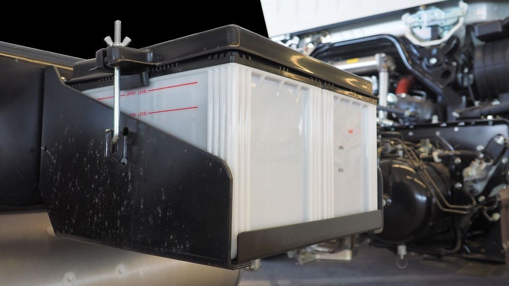 Large Rectangular Battery in a Black Bracket, With a Securing Clamp — ASAP Batteries & Breakdowns in Burleigh Heads, QLD