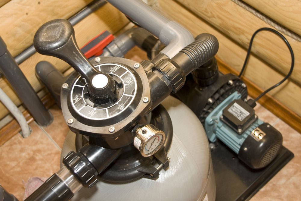 Close-up of a Pool Filter System With a Valve, Pump — Donna's Pool & Spa Centre In Port