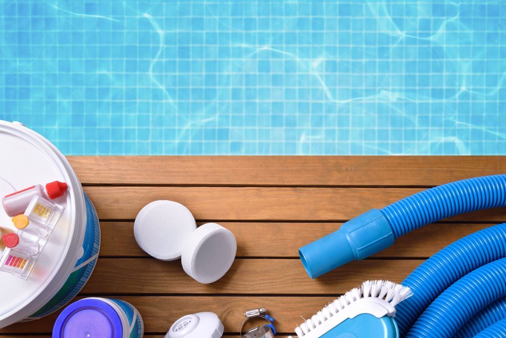 Poolside View: Chlorine Tablets, Pool Vacuum, Test Kit — Donna's Pool & Spa Centre In Port