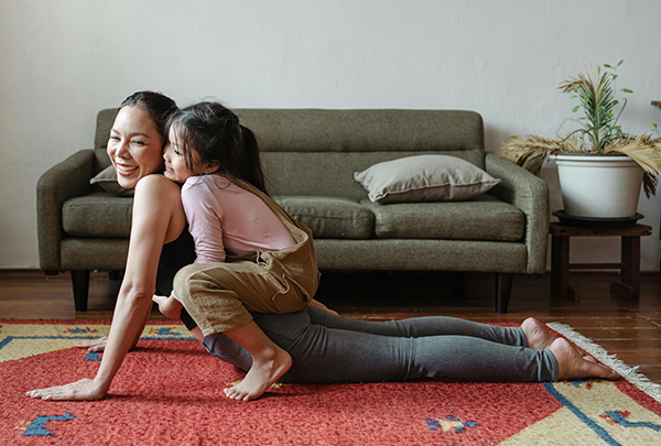 Mom and daughter playing on the floor