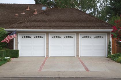 house garage with concrete driveway
