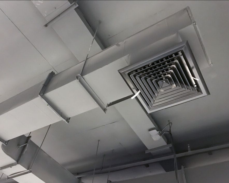 A Ceiling With Ducts And A Square Vent — Ramm Air Conditioning In Port Macquarie, NSW