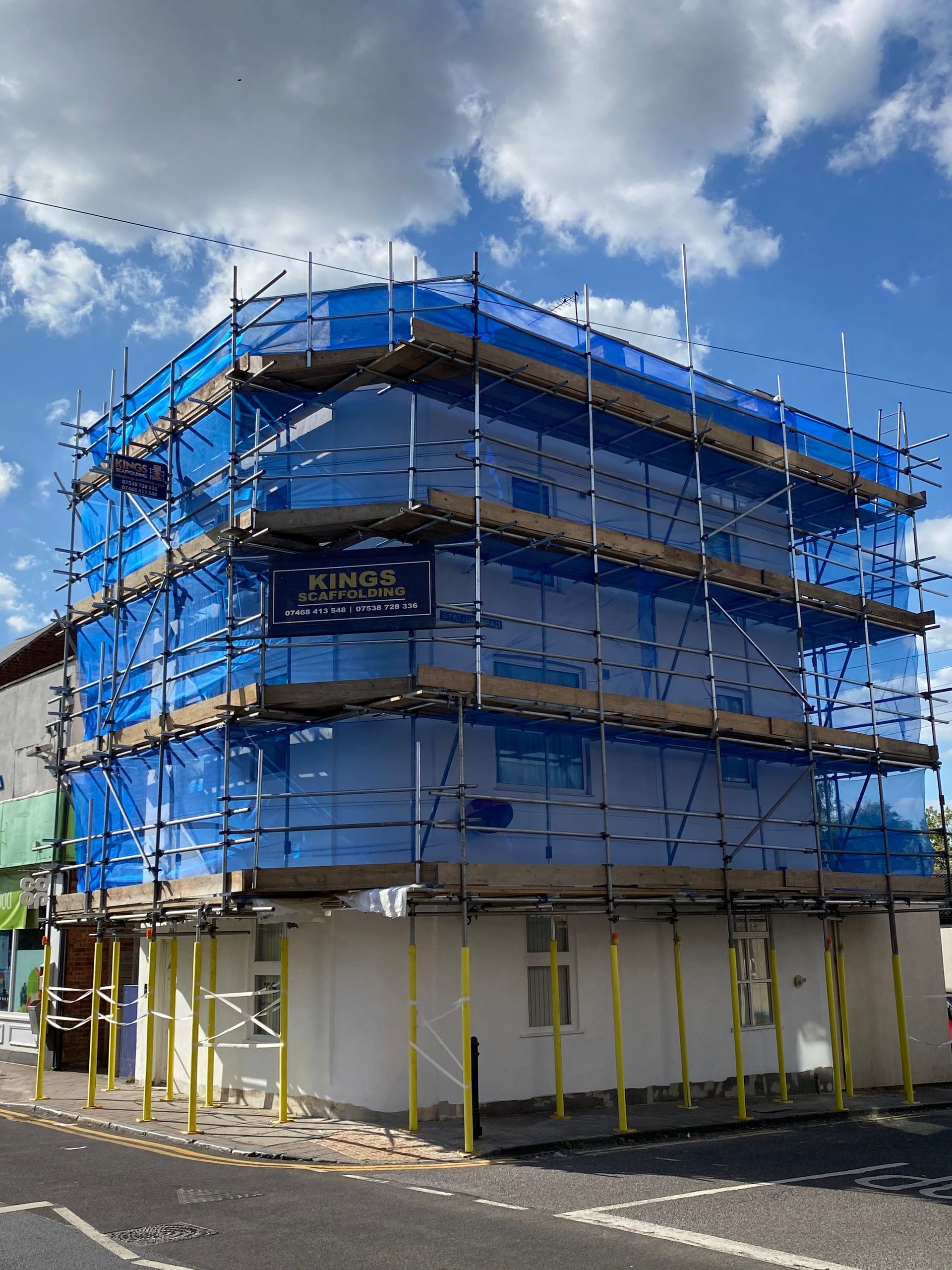 A building under construction with scaffolding around it