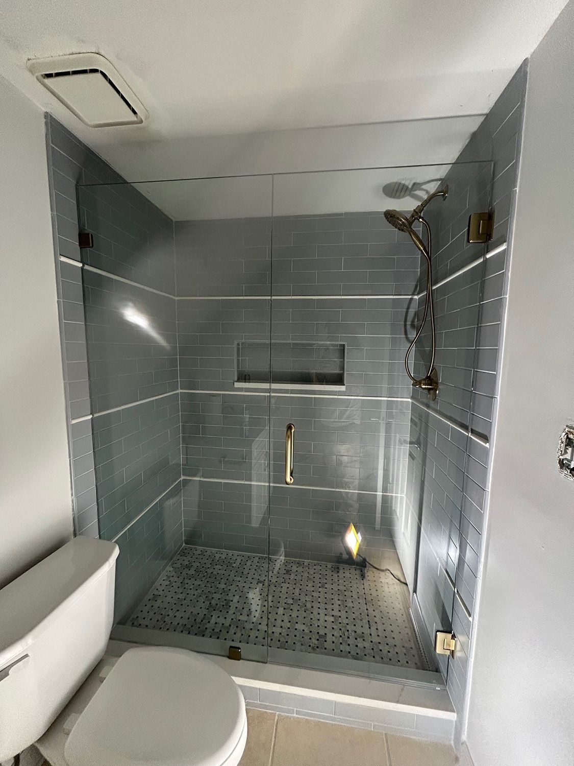 Frameless shower door 186