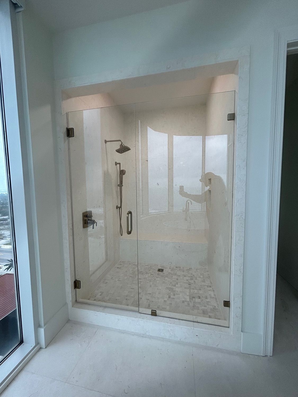 Frameless shower door 184