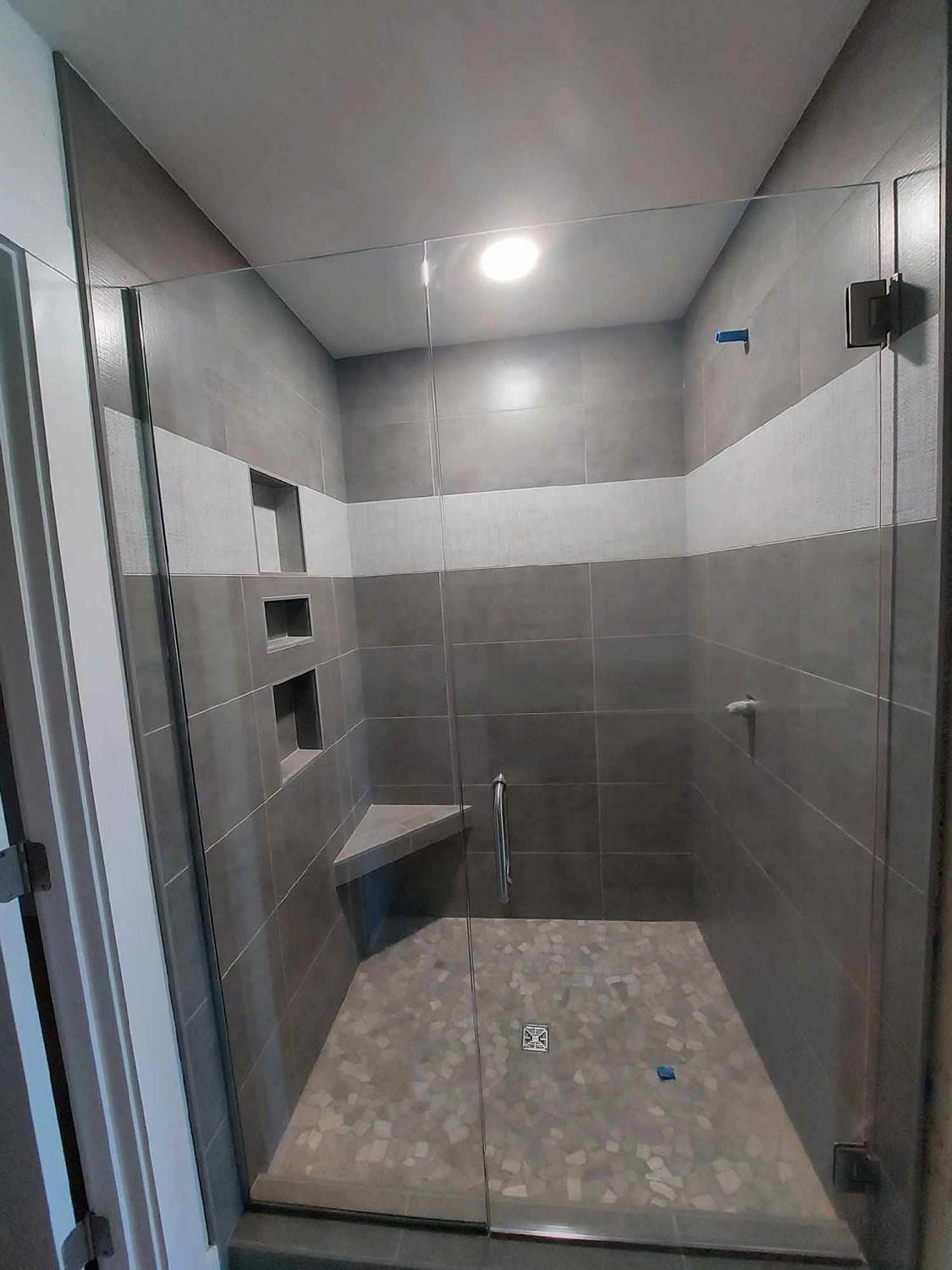 Frameless shower door 136