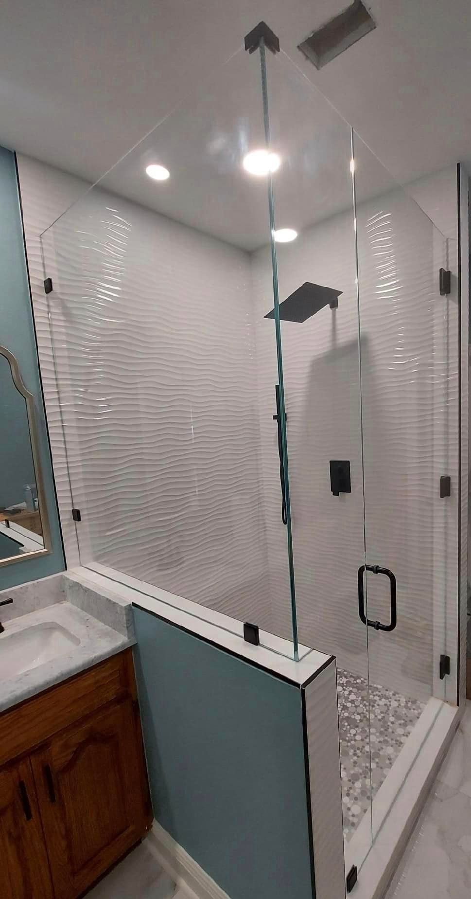 Frameless shower door 132