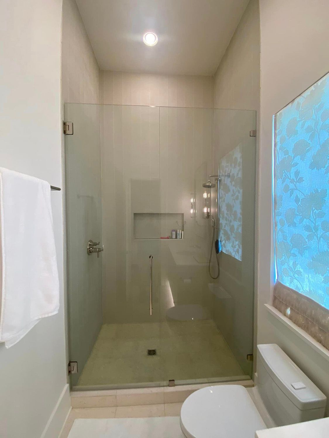 Frameless shower door 105