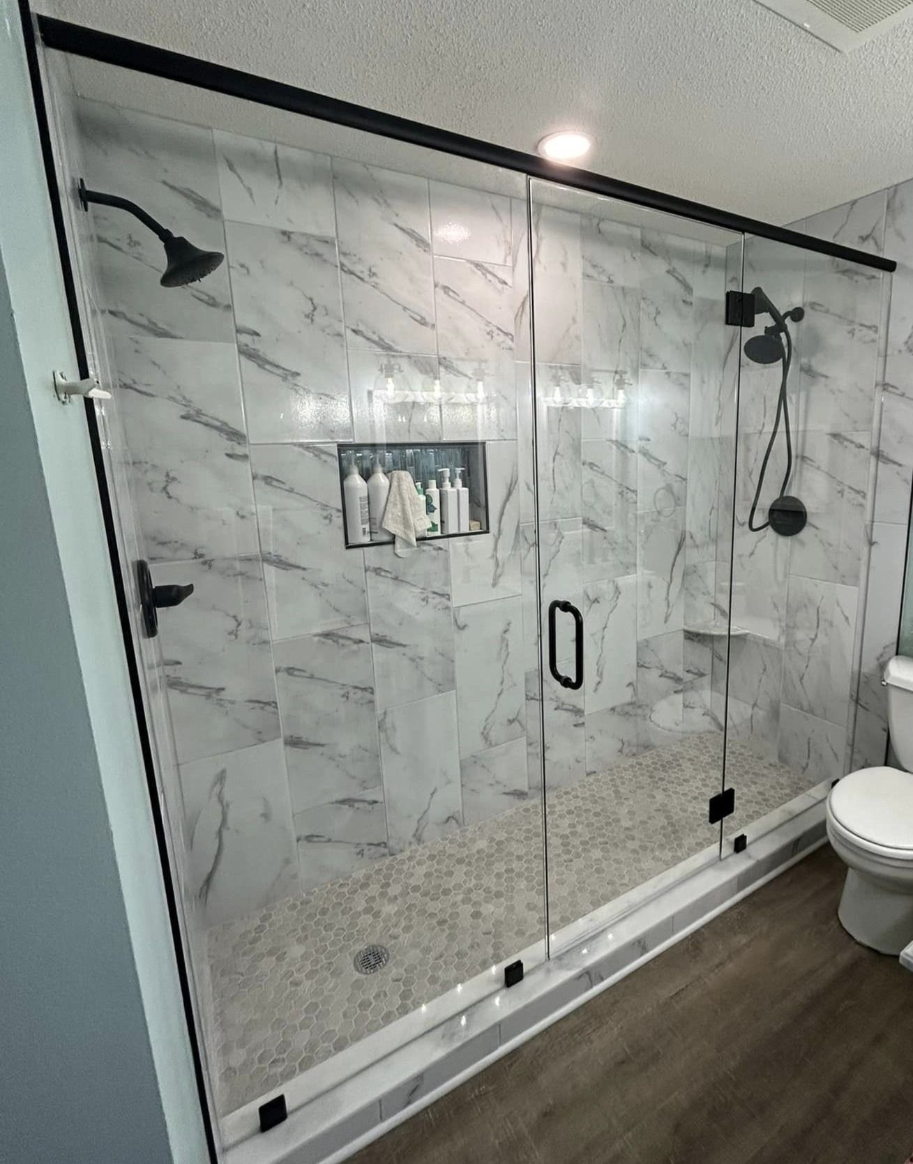 Frameless shower door 103
