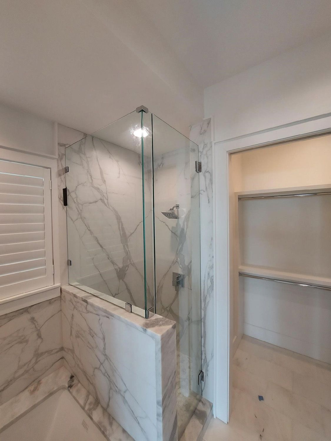 Frameless shower door 126