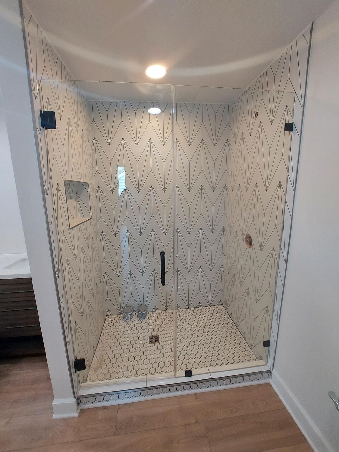 Frameless shower door 125