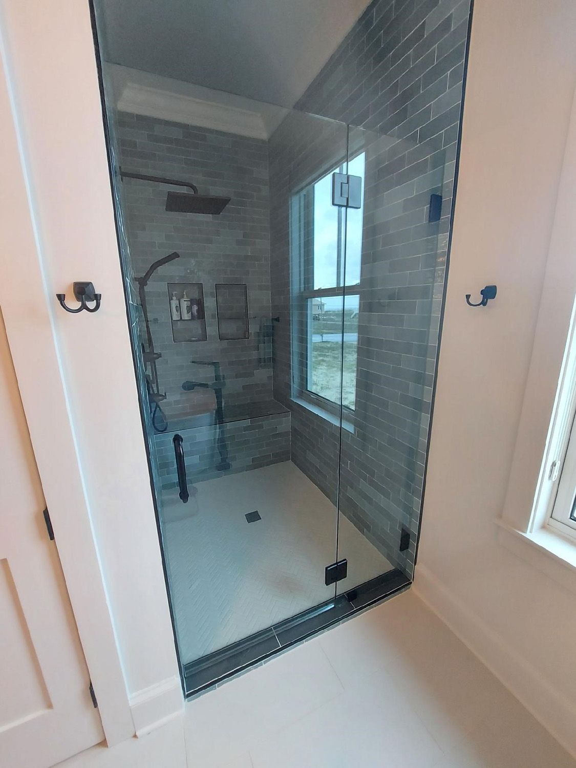 Frameless shower door 118